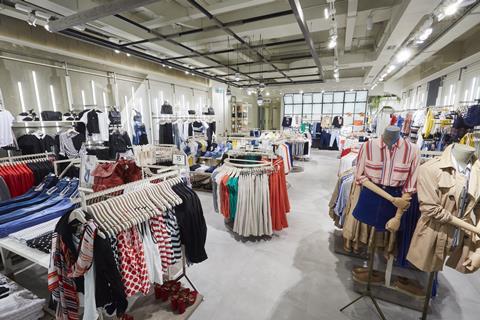 The appearance is striking, with the collections displayed along the wall and the mid-shop space used for basic assortments